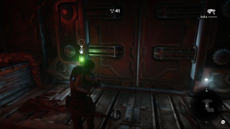 The Navigation Ping feature in action – the visual cue screen left is accompanied by a unique audio ping that lets the player know to interact with the door button to open it